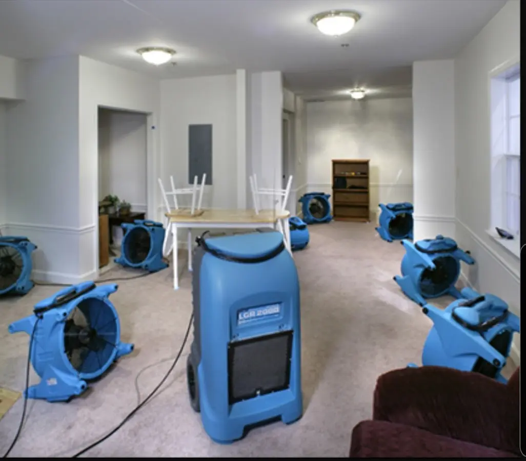 Air movers and dehumidifier setup for Water Damage Restoration in Chain Lake